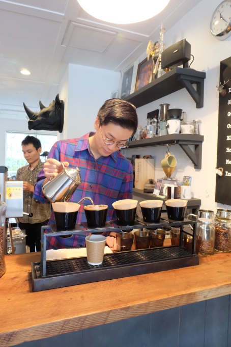 Barista making pour-over at Arise Coffee Entangle Kiyosumi Shirakawa Tokyo Japan